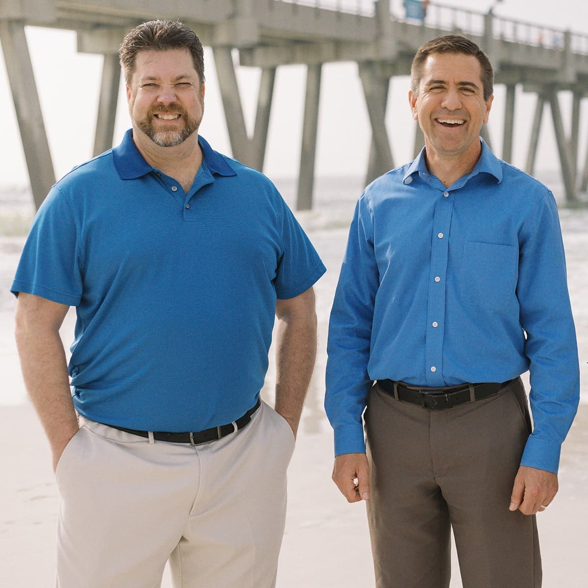 michael and rob standing on beach in destin