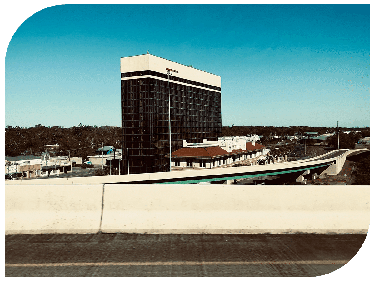 grand plaza hotel viewed from 110 interchange in pensacola