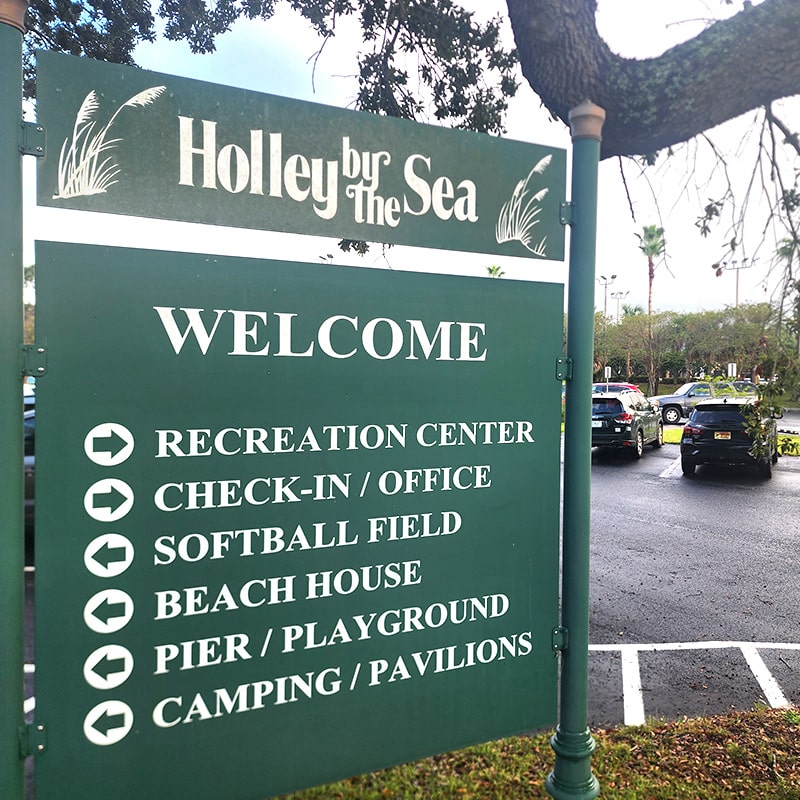 holly by the sea sign
