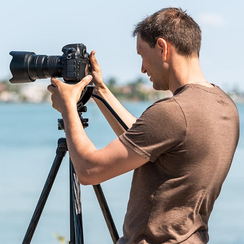 photographer taking photos of rental home exterior